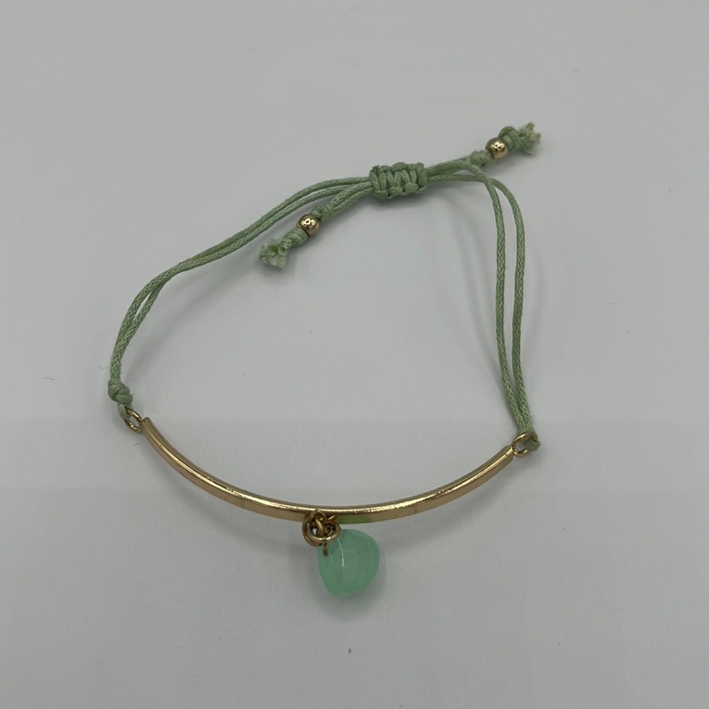 Rope bracelet with metal bar